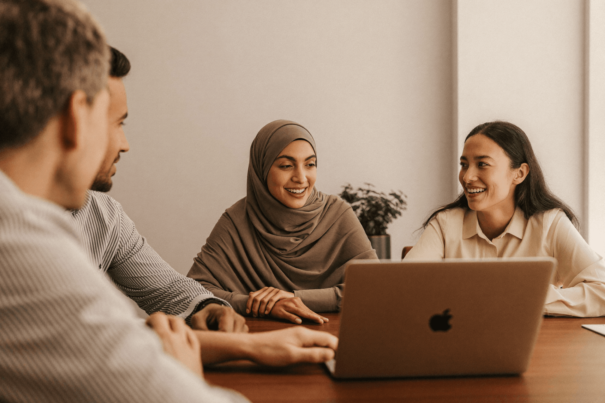A fundraising team reviewing donor analytics together